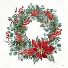 a christmas wreath with red berries and green leaves