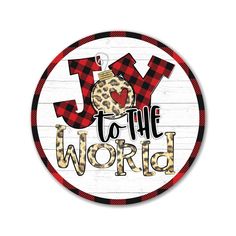 a wooden sign with the words joy to the world in plaid and leopard print on it