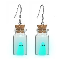 PRICES MAY VARY. Blue Adopt Ghost Earrings: This is a pair of glowing ghost pendant earrings, the pendant is a glass bottle with a cute glowing ghost in it respectively, when it is exposed to sunlight or violet light for 10 minutes, it will glow in the darkness, they glow like an elf, they are guarding your side as if you control them with magic, it will bring you good luck. High Quality: These cute ghost earrings are made of alloy, glass and resin, the earring hooks are alloy material with a ve Ghost In A Bottle, Adopt A Ghost, Blue Ghost, Halloween Pendant, Witch Dress, Bottle Earrings, Mini Glass Bottles, Ghost Earrings, Earrings Halloween