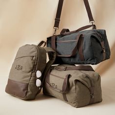 "MATCHING DUFFEL BAG + BACKPACK SET PERSONALIZED This classic canvas duffel bag and matching backpack are made with sturdy cotton canvas. Both practical and durable these bags will hold everything you need for a weekend getaway or for a trip to the gym. The duffle bag interior contains a zipper pocket to provide additional organization and allow quick access to valuables, while the backpack features a padded pocket for a laptop or tablet, with additional smaller pockets for other electronics or Mens Overnight Bag, Groomsmen Bags, Mens Duffle Bag, Mens Weekend Bag, Canvas Weekender Bag, Canvas Duffel Bag, Canvas Duffle Bag, Duffel Bag Backpack, Personalized Canvas