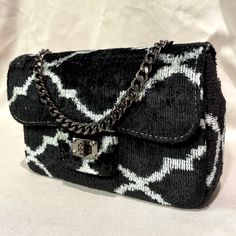 Mila∞Miro by Emelie · Divine coco bag in handwoven Uzbek ikat · Made of 100% silk velvet fabric · Black chain and inner pocket with zipper · Carried as crossbody, shoulder and top-handle bag · Size ±: W22 x H15 x D6 cm (9 x 6 x 2.5 inch) · Free shipping! Kindly note: - These bags are made-to-order. Position of pattern can differ from product pictures displayed. Colors in reality may also differ a bit depending on angle, light, and the screen of your device. - Ikat is an exquisite fabric, every p Designer Woven Shoulder Bag For Evening, Luxury Woven Clutch Shoulder Bag, Luxury Woven Bags As Fashion Accessory, Luxury Woven Clutch, Uzbek Ikat, Silk Velvet Fabric, Fabric Black, Black Chain, Product Pictures