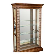 a wooden display case with glass shelves on the front and bottom shelf, inlaid with intricate designs