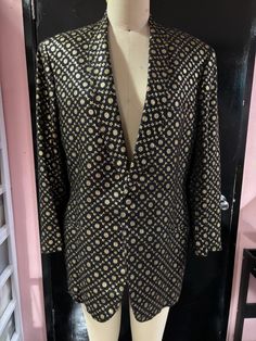 Channel your inner James Bond with this pristine vintage 1960s dinner jacket. Made in Homg Kong by Plaza House, the jacket is woven in a subtle brocade with gold embroidered accents. Still has both extra buttons. No size as it was like made for a client but it measures about 46" across the chest. Average length. Traditional Embroidered Gold Nehru Jacket, Formal Gold Outerwear With Double-breasted Button Fastening, Gold Tailored Suit-collar Outerwear, Luxury Embroidered Men's Outerwear, Luxury Men's Outerwear With Gold Embroidery, Dinner Jacket, Mens Gold, Vintage Men, Mens Jackets