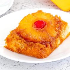 a pineapple upside down cake on a white plate