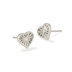 Our obsession with hearts isn't going to stop any time soon, and with the Anna Sunburst Stud Earrings, we're sure you'll feel the same. These sweet studs feature carved details to create a bursting design, while a princess cut crystal adds a pop of sparkle. To preserve your fashion jewelry for years to come, agents such as soaps, perfumes, lotions, makeup, hair and cleaning products, and other chemical contact should be avoided. Take care to remove jewelry before showering, sleeping, exercising Ivory Earrings, Silver Statement Earrings, Stud Earrings Set, Accessories Jewelry Earrings, Kendra Scott, Gold Pearl, Gold Earrings Studs, Silver Hoop Earrings, Silver Earrings Studs