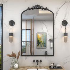 a bathroom with a marble counter top and mirror above the sink, along with two lights on either side of the wall