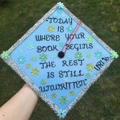 a blue graduation cap that says today is where your book begins the rest is still unwritten