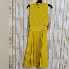 New With Tags Nanette Lepore Stretch Knee Length Dress Size 4 Has Some Stretch Really Nice Heavy Material Color Mustard Yellow/Golden Cyprus Lining Under Outer Skirt No Stains No Rips Please Check The Pictures For Better Description And Measurements. Yellow Pleated A-line Midi Dress, Yellow Pleated Sleeveless Midi Dress, Fitted Yellow Pleated Midi Dress, Elegant Yellow Pleated Midi Dress, Yellow Stretch Midi Dress, Elegant Stretch Yellow Midi Dress, Elegant Yellow Stretch Midi Dress, Yellow Stretch Knee-length Dress, Yellow Sleeveless Pleated Dress