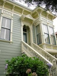 an old house with many windows and balconies