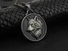 Personalized Sterling Silver Wolf Head Men's Necklace in Oxidized, Charming Wild Wolf Jewelry For Bestfriend, Best Animal Gift Idea For Dad Looking for a gift? You've found the perfect item for this! All our products are made in 925 sterling silver, the highest quality precious metal. In our workshop, everything is carefully handled in happy hands. A classic and beautiful necklace that will suit any style of clothing, everyday or event. Our products will be with you in every special moment! For any questions regarding this piece or our collection please reach out. We love talking to our customers. ITEM DETAILS GENDER : Male / Female MATERIAL : 925K Sterling Silver COLOR: Oxidized / Polished / Gold Plated ◆ WEIGHT : 08.75 Grams ( JUST PENDANT ) ◆ ◆ DIAMETER : 1.04 Inches & 2.65 Cm  ◆ BAIL W Wolf Medallion, Silver Necklace Men, Mens Pendant Necklace, Wolf Pendant, Mens Necklace Pendant, Wolves Pendants, Wolf Necklace, Viking Pendant, Wolf Jewelry