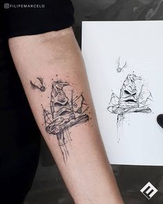 a person with a tattoo on their arm