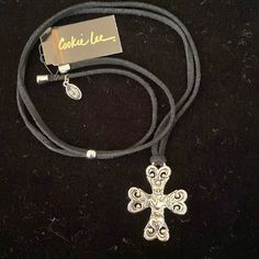 Nwt Womens Cookie Lee Lariat Cross Necklace Adjustable Black Suede Cord Tied To Silver Cross Charm The Cross Charm Has A Peace Dove, Heart & Flower Inlaid In The Silver. The Black Suede Cord Has A Silver Bead That Slides Up & Down To Adjust To Desired Size Of Necklace Never Worn Still With Original Tag Cookie Lee Jewelry, Cord Ties, Peace Dove, Heart Flower, Suede Cord, Silver Bead, Cross Charms, Silver Cross, Flower Heart