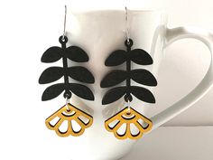 These beautiful Matisse inspired yellow flower laser cut wood earrings make a statement!  Perfect to go with any outfit. The plant shapes are laser cut out of lightweight wood and measure 30mm by 55mm. You can choose surgical stainless steel hooks or solid sterling hooks. Lightweight earrings with a bold vibe! To prolong the wear of the wood, take the earrings off when submersing into water. Wood Earrings Cricut, Acrylic Laser Cut Earrings, Laser Cut Earrings Wood, Laser Cut Wood Jewelry, Wood Leaves, Laser Cut Necklace, Laser Cut Wood Earrings, Laser Cut Wood Crafts, Laser Engraved Gifts