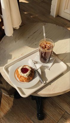 there is a plate with food and a drink on it