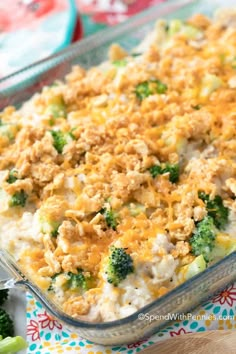 a casserole dish with broccoli and cheese