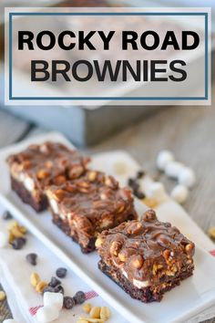 rocky road brownies on a white plate with marshmallows and chocolate chips