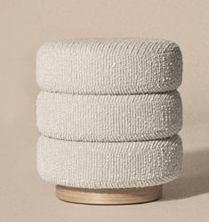 three white towels stacked on top of each other