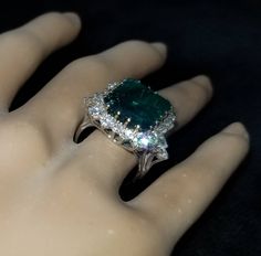 GORGEOUS 14K white gold emerald ring center lab grown GEM EMERALD BERYL EMERALD weight 12.75ct. size 15x12mm nice vivid green color , clean, very lively ,nice cut . side set natural rounds diamonds total weight 1.95ct H-SI1 Ring SIZE 6 Resizable Retail value $9,500 net. Cert Appraisal available Luxury Silver Emerald Cut Ring, Luxury Silver Emerald Rectangular Ring, Luxury Silver Rectangular Emerald Ring, Luxury Rectangular Emerald Ring In White Gold, White Gold Emerald Ring Square Cut, White Gold Emerald Ring, Gold Emerald Ring, Emerald Ring Vintage, Filigree Engagement Ring