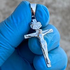 Jesus cross crucifix Italian silver pendant. Made with real solid 925 sterling silver. Stamped with 925 on the pendant bale. Beautiful masterpiece is handmade in Italy. Solid 925 piece weighs approx. 5 grams. 1.5" inch w/o bale and 1.75" inch with bale. About 1.5 inches wide at the cross ends. Fits 5 mm round chain (rope, franco, etc). Fits 7 mm flat chain (cuban, figaro, etc). Realistic attention to detail wood grain cross. 100% FREE SHIPPING in USA. Order now! Silver Crucifix Necklace With Polished Finish, Sterling Silver Cross Charms With Polished Finish, Silver Sterling Silver Cross Pendant Charm, Nickel-free Sterling Silver Cross Pendant, Silver Spiritual Crucifix Jewelry And Charms, Spiritual Silver Crucifix Jewelry And Charms, White Gold Sterling Silver Crucifix, Jesus Piece, Real Hip Hop