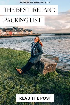 a woman sitting on a rock in front of the water with text overlay that reads,