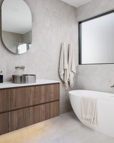 Modern luxe bathroom with rich timber tones from our Posh Domaine Vanity, unique stainless steel Kado Aspect Basin, sleek freestanding bath and large windows for natural bathroom lighting.  

Reece featured products 🛁:
@north_homes: Posh Domaine Vanity, Kado Aspect Basin, Mizu Drift tapware and Kado Lussi Freestanding Bath