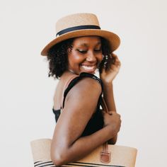 The Panama Piper Straw Hat is light-colored, lightweight, and breathable and perfect to dress up or casually this summer. This adjustable hat features a wide detailed band in either brown or black to pair with any outfit of your choosing. Take it to the beach or a summer wedding offering sun protection and style! 23.5" Adjustable Circumference 3" Wide Brim 2 Color options, brown or black PS Metal Tag on hat 100% Paper material Baggallini Bags, Athleisure Sneakers, Metal Tag, Clog Slippers, Metal Tags, Paper Material, Women's Hats, Flip Flop Shoes, Adjustable Hat