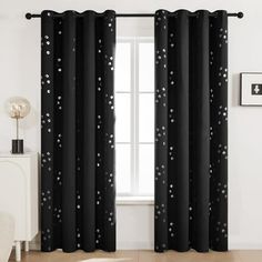 black and white curtains with polka dots on them