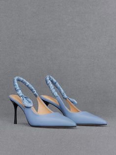 Light Blue Leather Ruched Print Slingback Pumps | CHARLES & KEITH Blue Padded Heel Slingback Pumps For Evening, Casual Slingback Pumps With Ankle Strap For Party, Casual Slingback High Heel Pumps For Party, Casual Ankle Strap Slingback Pumps For Party, Summer Slingback Pumps With Pointed Toe And Adjustable Straps, Summer Pointed Toe Slingback Pumps With Adjustable Straps, Blue Slingback Pumps With Padded Heel For Spring, Blue Ankle Strap Slingback Pumps With Padded Heel, Chic Slingback Pumps With Straps