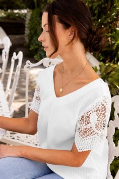 Introducing our White V-Neck Lace Sleeve Top, combining comfort with delicate detailing. Crafted from soft fabric, it ensures all-day wearability, while the intricate lace sleeves add a touch of charm to your ensemble. Product code: CAA04B4E064CC Features:  Woven V-neckline Short sleeves Lace trims Wash Method: Regular Wash Material: 100%POLYESTER. Lace Sleeve Top, Affordable Swimwear, Make Memories, Lace Trims, Neck Lace, Lace Sleeves, Have Fun, Body Shapes, Jumpsuits For Women