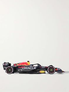 a red bull racing car on a white background