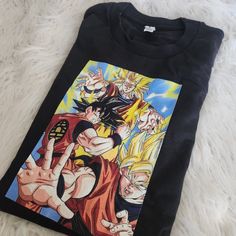 a t - shirt with an image of dragon ball characters on it