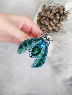 "Beautiful beetle brooch (cicada brooch) is lovely handmade by me. 💓 This beautiful hand embroidered beetle brooch (cicada brooch) took hours of precision and elaborate embroidery work. This cicada brooch will be a wonderful gift to a very special person! SIZE Brooch size ~ 2.16\" * 2.75\" (5.5 * 7 cm) MATERIALS Made of czech, japanese seed beads, glass crystals and sequins. Beaded jewelry requires careful and loving care. Avoid contact with hairspray, perfume, water, bleaches & lotions. Av Unique Handmade Green Brooches, Unique Beaded Brooches For Crafting, Handmade Unique Brooches For Crafting, Handmade Pendant Brooches, Unique Handmade Pendant Brooch, Green Pendant Brooch For Gift, Embroidered Beetle, Cicada Brooch, Elaborate Embroidery