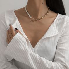 Invite shimmering splendor to your jewelry collection with this imitation pearl necklace that features a lush?18k gold-plated hue on the other side. 15.3'' L Toggle closure 18k gold-plated copper / imitation pearl Women Choker Necklace, Toggle Necklace, Choker Necklace Set, Circle Pendant Necklace, Neck Jewellery, Pearl Choker Necklace, Environmental Friendly, Bead Chain, Chain Choker Necklace