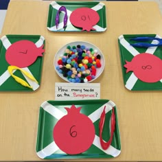 the table is set up with paper plates and placemats for numbers 1 - 10