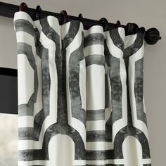 a curtain with black and white designs on it