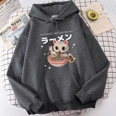 Harajuku Ramen Cat Hoodie: Embrace Kawaii Comfort with Feline Flair Wrap yourself in the purr-fect blend of comfort and quirky style with our Harajuku Ramen Cat Hoodie. This cozy hoodie is not just an outfit; it's a fashion statement that combines the charm of a mischievous cat with the delicious allure of everyone's favorite comfort food – ramen. Key Features: Adorable Cat Design: The hoodie features an irresistibly cute cat eating a bowl of steaming ramen. The playful and vibrant design adds a Casual Hoodie With Cat Design, Casual Cat Design Hoodie Sweatshirt, Casual Hoodie Sweatshirt With Cat Design, Casual Hooded Hoodie With Cat Print, Casual Black Hoodie With Cat Print, Casual Winter Hoodie With Cat Design, Kawaii Long Sleeve Hoodie With Cat Design, Casual Hoodie With Cat Design And Crew Neck, Casual Winter Hoodie With Cat Print