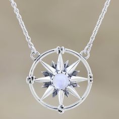 Let this mystical compass from India's Shivani Choudhary be your guiding light in dark times. A round rainbow moonstone centers the compass, which is crafted from polished sterling silver. The pendant hangs from a sterling silver rolo chain that fastens with a lobster claw clasp. Spiritual Round Jewelry With Compass Design, Celestial Compass Design Round Necklaces, Light In Dark, Moonstone Pendant Necklace, Dark Times, Rainbow Moonstone Pendant, The Compass, Expressionist Art, Guiding Light