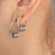 Introducing our unique Cyberpunk Style Encircled Clip-On Hoop Earrings, perfect for non-piercing earlobes! These edgy stainless steel earrings are the perfect accessory to add an industrial flair to your look. With their sleek design and easy clip-on feature, you can effortlessly rock a bold cyberpunk vibe without the commitment of a piercing. Stand out from the crowd with these statement earrings that are sure to elevate any outfit to the next level of cool. ▪️▪️▪️PRODUCT Non Piercing Clip On Hoop Earrings  316L surgical stainless steel  Never Fade and Hypoallergenic Hoop Thickness 2.3mm Sold by Pair=2pcs VISIT STORE FOR MORE PRODUCT 🔗 https://www.etsy.com/ca/shop/TWISTEEL ▪️▪️▪️ S H I P P I N G   All orders will be shipped on the next business day UNITED STATES  - USPS First-Class Mail Cheap Nickel Free Clip-on Earrings, Affordable Trendy Nickel-free Clip-on Earrings, Cheap Trendy Nickel-free Clip-on Earrings, Cheap Nickel-free Hoop Clip-on Earrings, Cheap Minimalist Nickel-free Clip-on Earrings, Style Cyberpunk, Piercing Clip, Clip On Hoop Earrings, Clip On Earring