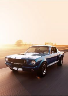 an old car driving down the road with the words retro cars on it's side