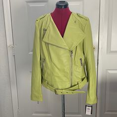 Awesome Lime Green Genuine Leather Jacket By Black Rivet Size X It Has 3 Zipper Pockets, A Front Belt And Zippers On The Sleeves This Is New With Tags Back Length 22 Armpit To Armpit 22 Green Leather Biker Jacket For Spring, Green Biker Outerwear For Spring, Green Spring Biker Leather Jacket, Green Biker Jacket For Spring, Green Long Sleeve Biker Jacket For Spring, Casual Green Biker Jacket For Spring, Green Leather Jacket For Spring Workwear, Fitted Green Biker Jacket For Spring, Chic Green Leather Jacket