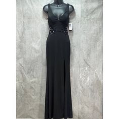 City Studio Juniors Black Rhinestone Cutout Gown Sz 3 Deep V-Neck With Strap, V-Back Hidden Back Zipper Imported Molded Cups Rhinestone Appliqus At Cutout Sides Dry Clean Polyester/Cotton/Spandex; Lining: Polyester This Is A New With Tags Item. Please Refer To Images. Approx. Measurements: * Waist: 13" * Length: 62" * Chest: 16" * Hip: 17" Retail Price: $109.00 Fitted Rhinestone Maxi Dress For Night Out, Fitted Maxi Evening Dress With Rhinestones, Fitted V-neck Gown With Rhinestones, Embellished V-neck Maxi Dress For Night Out, Black Rhinestone Gown For Evening, Black Rhinestone Evening Gown, Fitted V-neck Evening Dress With Rhinestones, Formal Fitted Maxi Dress With Rhinestones, Fitted Maxi Dress With Rhinestones For Formal Occasions