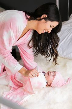 "Pink Tie Dye Maternity/Postpartum Robe, Baby Swaddle, Matching Hat & Bow MATERIAL: 95% Polyester 5% Spandex. A very soft and stretchy material. MEASUREMENTS: Maternity Robe - One Size Fit Most: > bust/waist/hip: 60 inches > robe length: 39 inches Swaddle: > 45 by 45 inches Knotted Hat: > fits newborn to 3/6 months Bow Headband: > fits newborn to - 3 years >>Due to the nature of this pattern (tie-dye), items will vary in design and may have slight color variance from the Fitted Pink Onesie For Bedtime, Family Matching Pink Sleepwear, Pink Family Matching Sleepwear, White Nursing-friendly Sleepwear, Pink Matching Sleepwear, Cute Pink Onesie For Mother's Day, Swaddle Sets, Baby Girl Shower Gifts, Pink Tie Dye