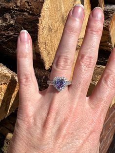 The purple cubic zirconia in this ring has a measurement of approx. 7.8mm x 7.5mm. The other cubic zirconias in this ring have a measurement of approx. 1.9mm. The back of shank has a measurement of approx. 3.4mm. This ring weighs approx. 4.7 grams. Size: 8 US. Stock number: 257 Cubic Zirconia Rings, Purple Heart, The Purple, Statement Rings, Cubic Zirconia, Sterling Silver, Ring, Purple, Silver