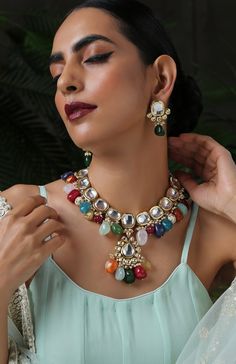 This navrattan necklace set with its pop of colors and quirky shapes is a sublime piece. The subtelty of the polki with hints of muted golden tones creates the perfect balance to create a winning look. Necklace Closure - Adjustable Dori Earrings Closure - Push Back Style Tip - This multicolored piece of art is perfect for gracing traditional funtions in full pomp and show. Navrattan itself being the traditional epitome of prosperity, wealth and status. What could be better than Handcrafted in Ja Multicolor Necklaces For Festive Gifts, Multicolor Temple Jewelry Necklace As Gift, Multicolor Temple Jewelry Necklace For Gift, Multicolor Temple Jewelry Necklaces For Gift, Multicolor Handmade Kundan Necklace Gift, Handmade Multicolor Kundan Necklace For Party, Handmade Multicolor Kundan Necklace For Festivals, Handmade Multicolor Kundan Necklace Gift, Festive Multicolor Kundan Necklace As Gift