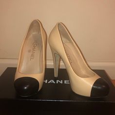 100% Authentic Chanel Captoe Pumps In Beige And Black. Timeless And Beautiful, Will Never Go Out Of Style And Works With Every Style. Chanel Logo On Captoe. Almond Toe. Beautiful Soft Leather. Heel Is 4 And Half Inches. 1 Inch Platform Excellent Condition. Clean, No Scratches Or Imperfections. Worn Only A Couple Of Times. Comes In Original Box And Protective Bag Beige Calf Leather Heels With Round Toe, Beige Almond Toe Court Shoes With Contrasting Heel, Cream Calf Leather Heels For Work, Luxury Cream Heels With Leather Sole, Classic Cream Court Shoes With Round Toe, Classic Cream Round Toe Heels, Cream High Heel Calf Leather Heels, Cream Calf Leather High Heels, Designer Cream Heels With Leather Sole