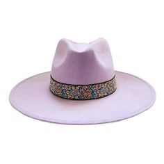 Introducing our stylish Rancher Hat, a perfect blend of comfort and fashion crafted for the modern adventurer. Made from durable polyester suede in an elegant purple hue, this hat exudes sophistication. Featuring a distinctive jacquard trim band, our Rancher Hat boasts a 4" brim and a 4" crown for a structured look that's both timeless and on-trend. The fitted elastic inner band and interior lining ensure a snug and comfortable fit. Please note, each hat is meticulously crafted with care, and no two are exactly alike. Due to the nature of our artisanal production process, this product is not mass-produced, making it truly unique. As such, we regret to inform you that this product is final sale and not eligible for returns. Please refer to our size guide to find your perfect fit: Size M: 22 Purple Fedora Hat For Spring, Adjustable Purple Brimmed Fedora, Adjustable Purple Fedora With Short Brim, Adjustable Purple Fedora Hat, Purple Adjustable Short Brim Fedora, Adjustable Wide Brim Purple Fedora, Adjustable Purple Fedora, Adjustable Purple Short Brim Fedora, Purple Fedora Winter Hat