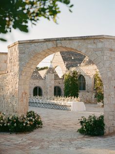 an outdoor wedding venue set up with tables and chairs