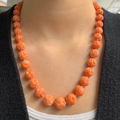 "Clasp: 16 mm x 8 mm  Metal: 14K Gold  Length: 21.0\" Primary Stone Type: Coral Primary Stone Shape: Carved Round Bead Primary Stone Dimensions: 5.00 mm - 14.25 mm  Weight: 71 gram" Formal Carved Round Necklace, Formal Round Carved Necklace, Traditional Carved Necklaces For Formal Occasions, Elegant Carved Round Necklace, Elegant Round Carved Necklaces, Elegant Carved Necklaces, Elegant Orange Jewelry With 8mm Beads, Elegant Carved Orange Jewelry, Elegant Orange Carved Jewelry