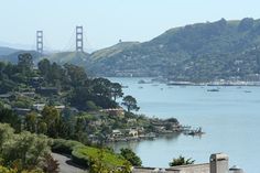 an aerial view of the bay and golden gate bridge