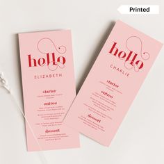 two pink menu cards with the word hello elizabeth printed on them, sitting next to each other